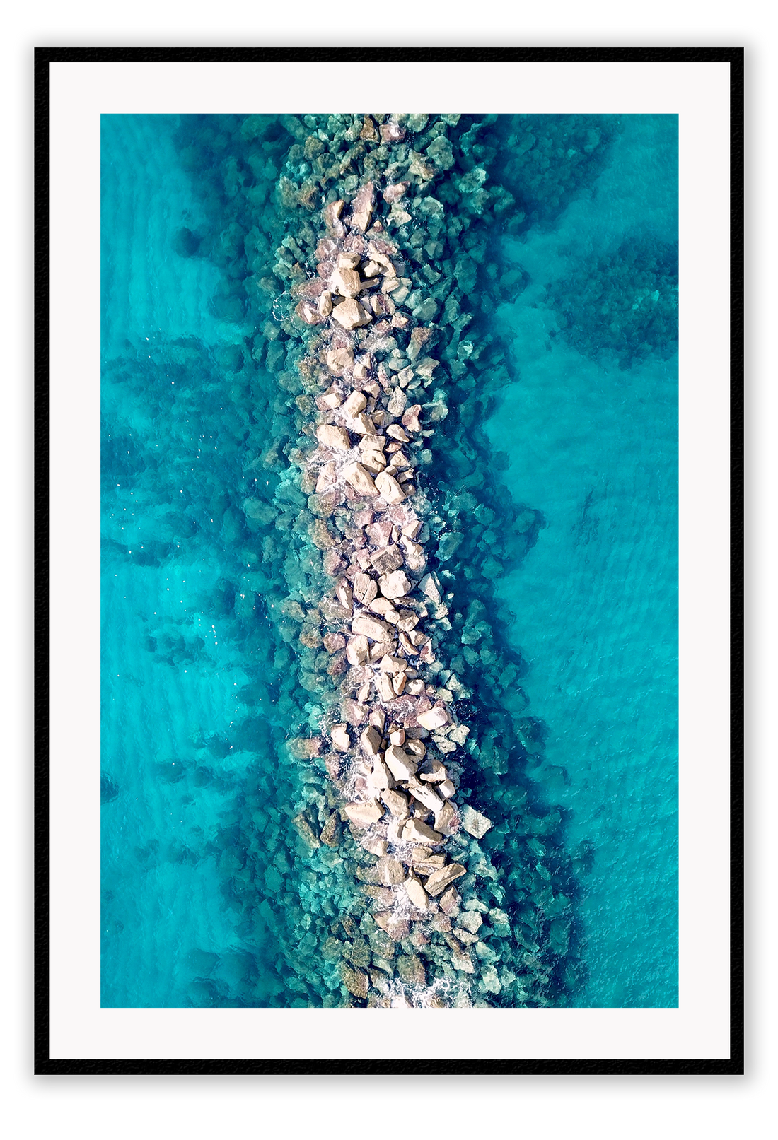 Ocean water rocks blue symmetry waves ripple clear sea