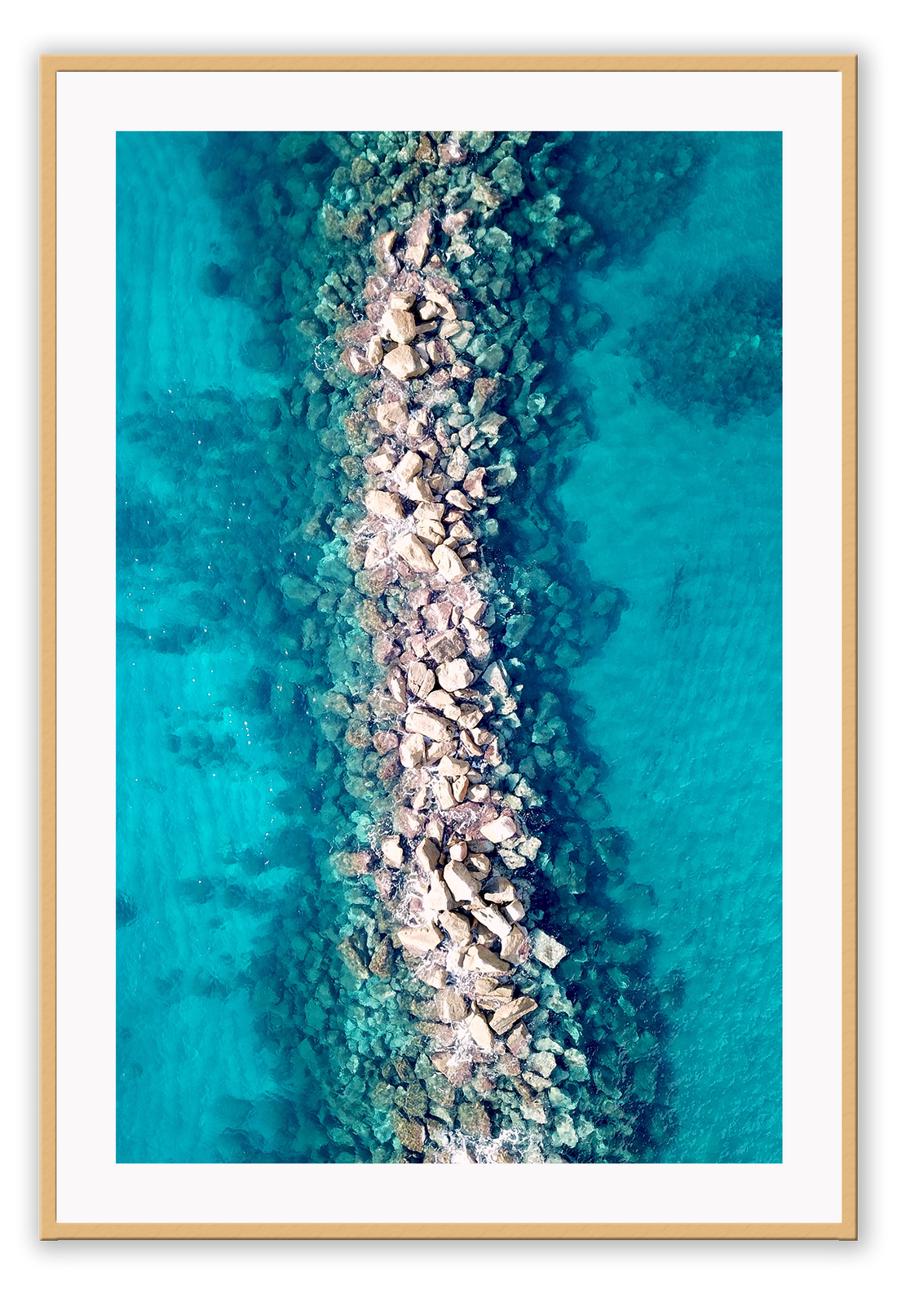 Ocean water rocks blue symmetry waves ripple clear sea